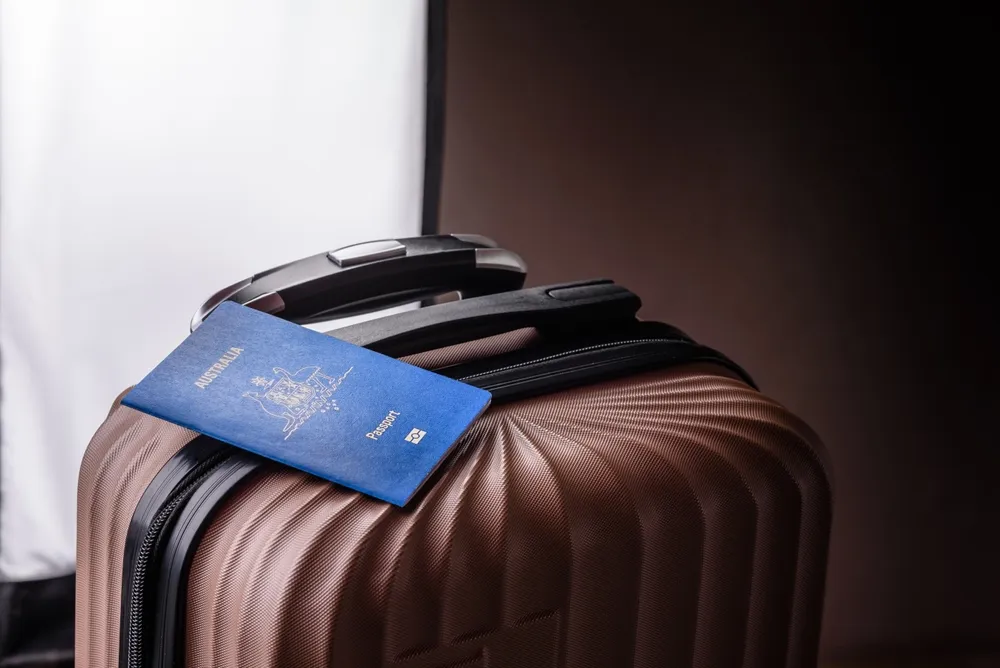 Australian Passport on top of a suitcase